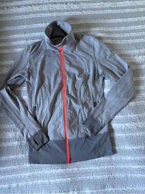Lululemon Sz 12, like new, Gray Zip-Up Jacket with neon orange accent